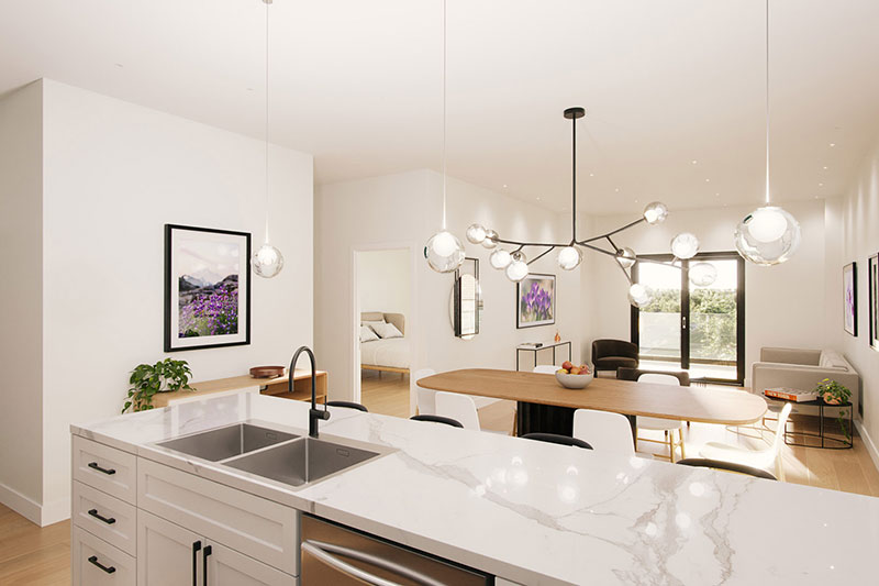 Interior view of the Violet living space and patio doors from the kitchen with bedroom opposite Violet